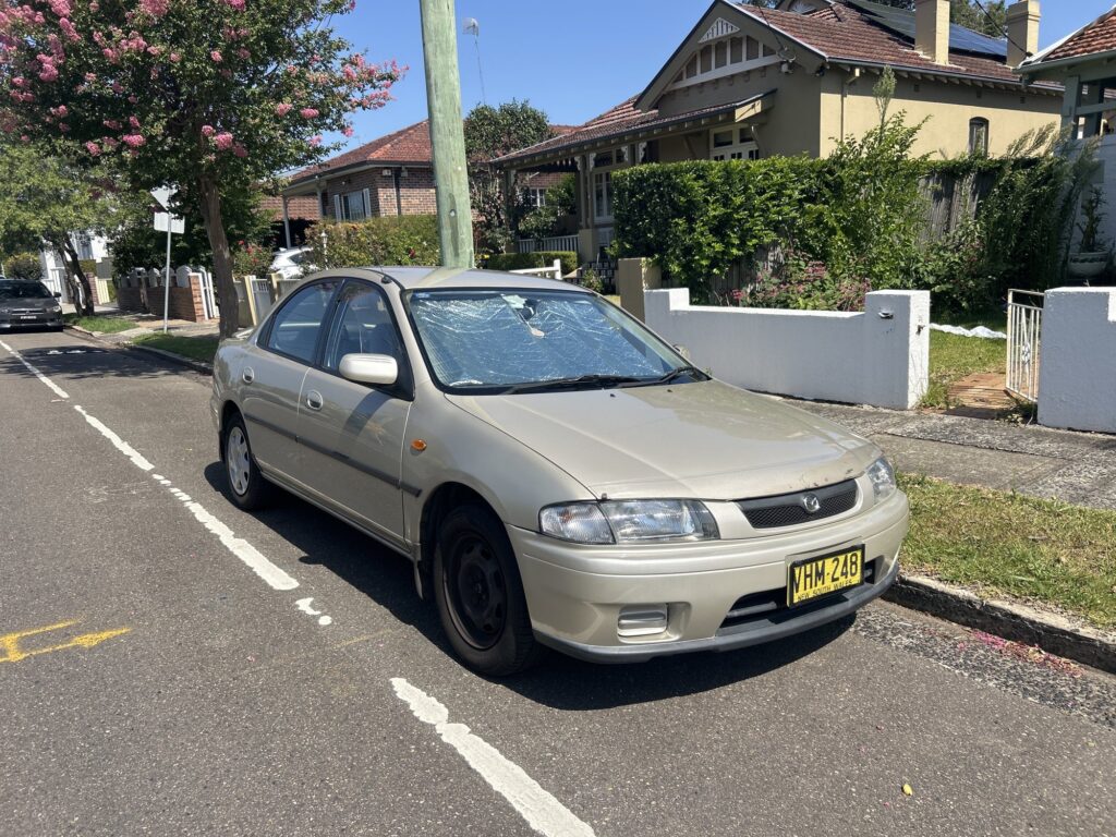 1998 Mazda 323 Champagne