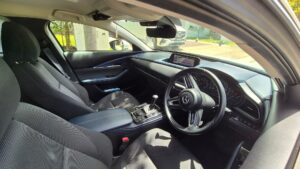 #8. Key angle showing driver and passenger seat from dash