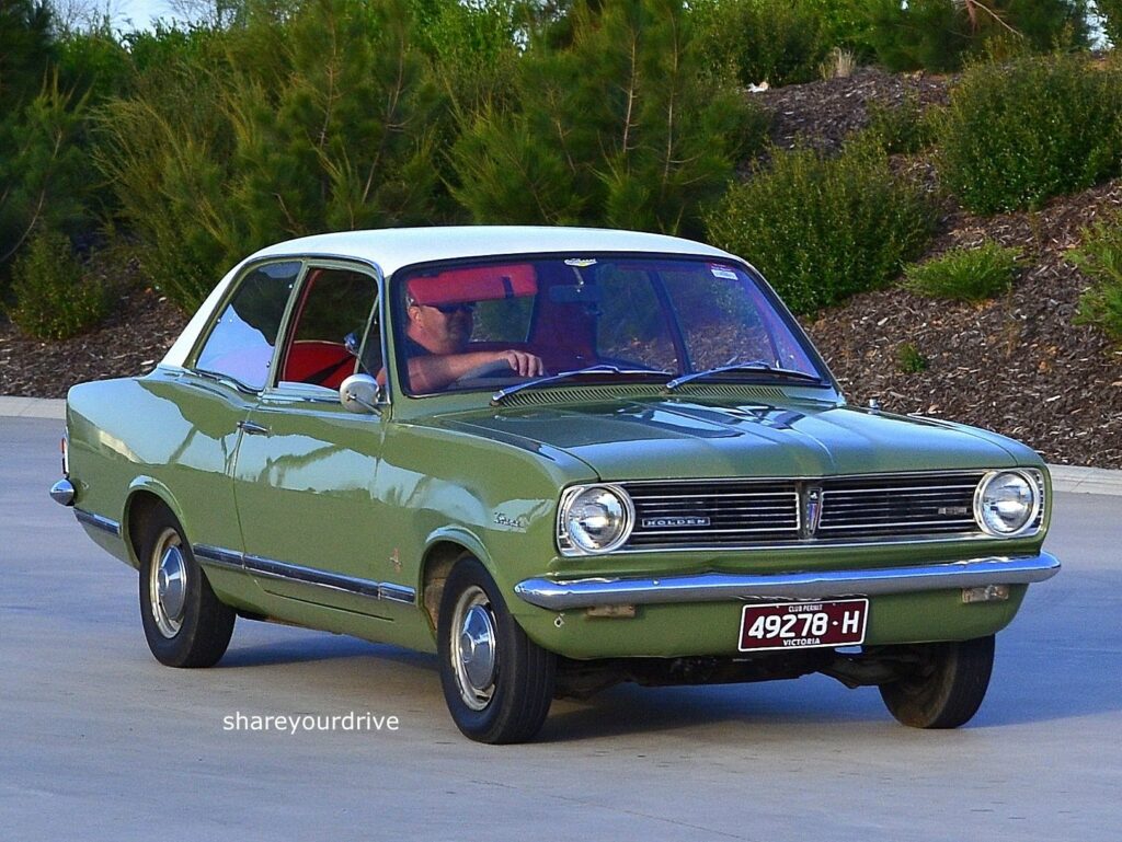 1968 Holden Torana Olive green body, white roof.