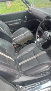#8. Key angle showing driver and passenger seat from dash