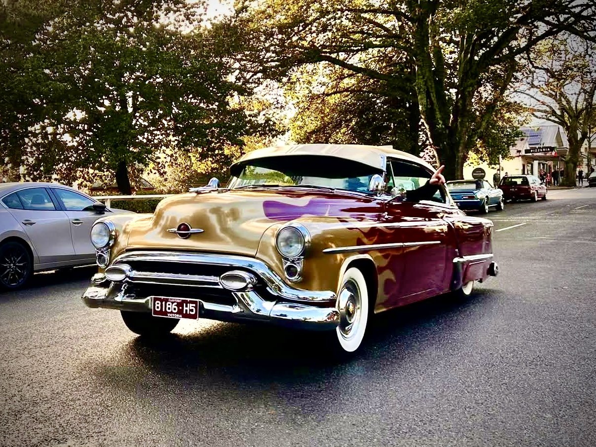 1953 Oldsmobile Super 88 holiday coupe Burgundy with gold flames